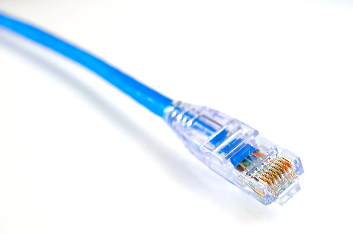A blue Ethernet cable with an RJ45 connector